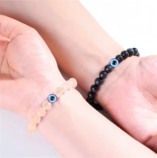 Peach N Black Bracelet With Evil Eye